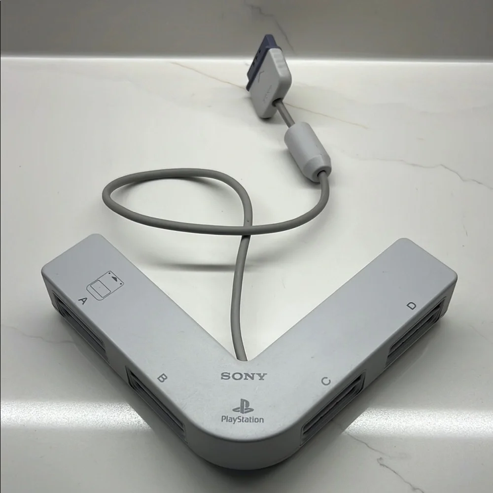 Sony PlayStation Gray Multi-Tap Adapter